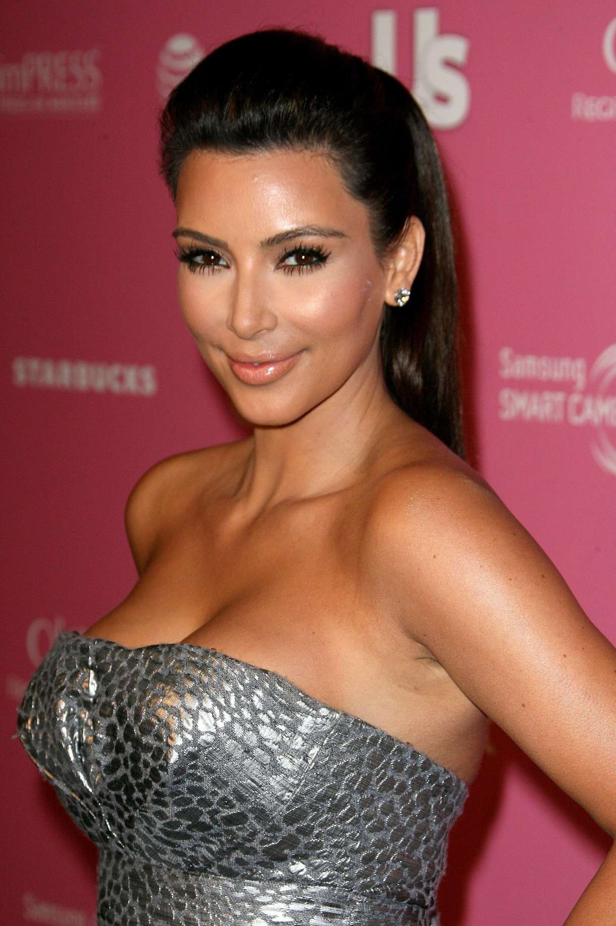 Kim Kardashian In a tight silver dress at 2012 US Weekly's Hot Hollywood Style Issue Event
